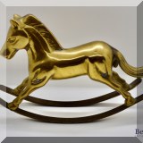 D36. Brass rocking horse figurine. 